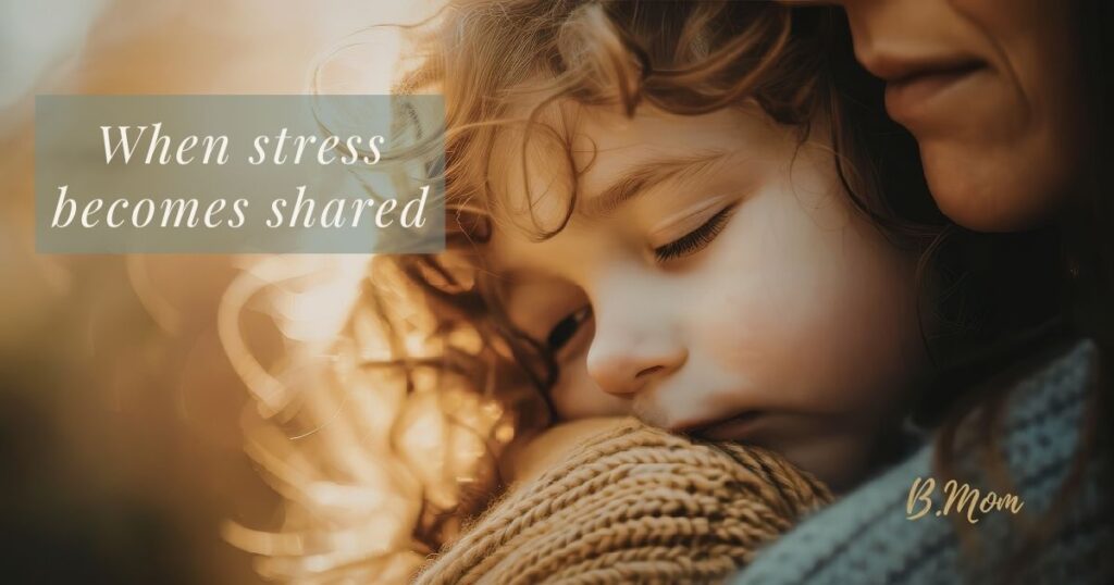 A child resting against a mother in warm light, with text reading: “When stress becomes shared.”